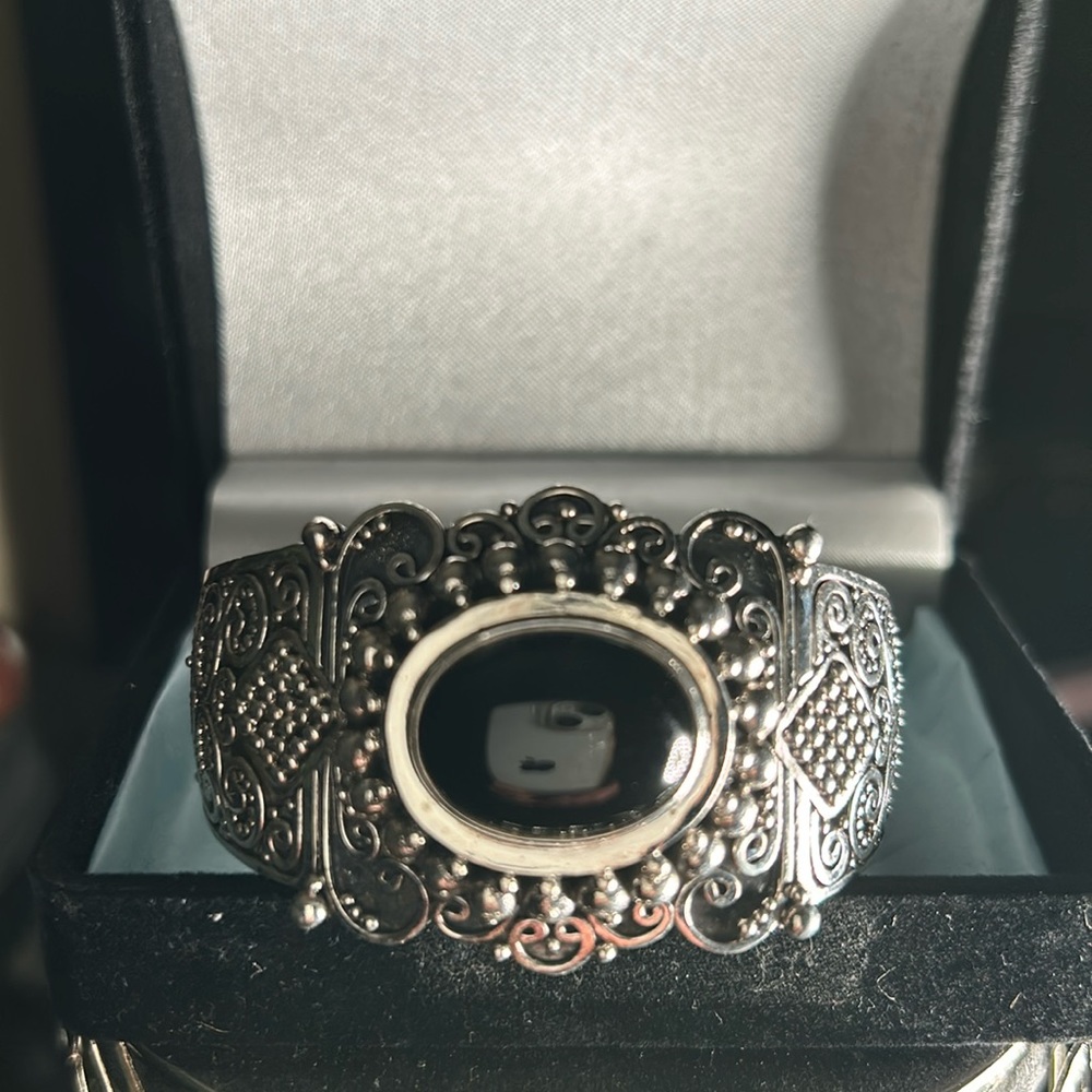 Black onyx and silver cuff bracelet. This is a gorgeous piece of jewelry.